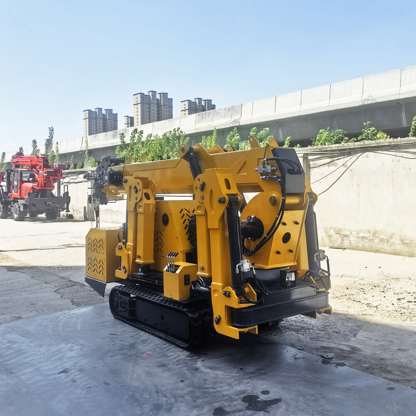 رافعة عنكبوتية صغيرة بحمولة 1. - مراجعة Compact Crawler Boom Lift وسعره